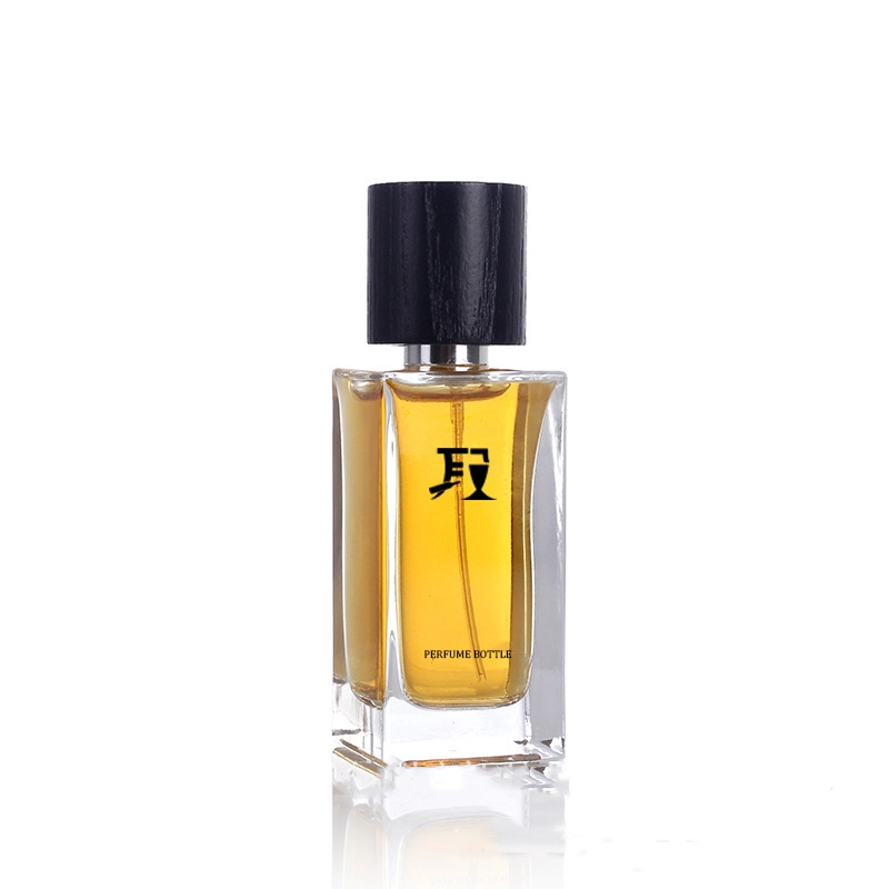 Empty glass rectangle perfume bottle